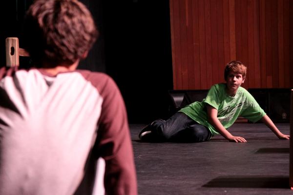 Freshmen Jake Dobbs, (left) and Colton Spampinato, (right)  rehearse one of their scenes that will take place in the fall comedy. They have spent many hours in the CAC working to perfect their parts. (credit: Jared Cohn) 
