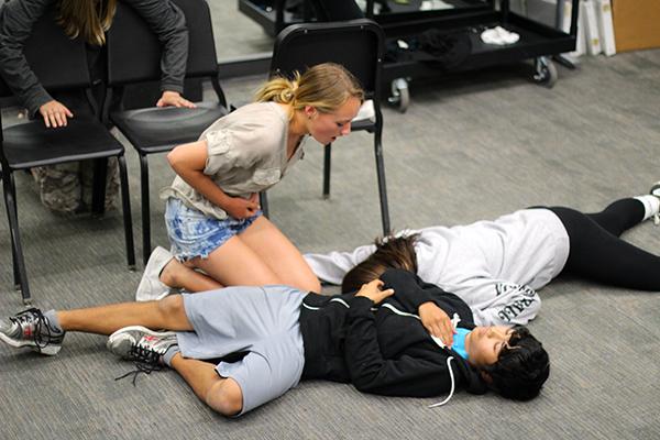 Middle school students act out Shakespeares Romeo and Juliet in front of the advanced theater class to get feedback.