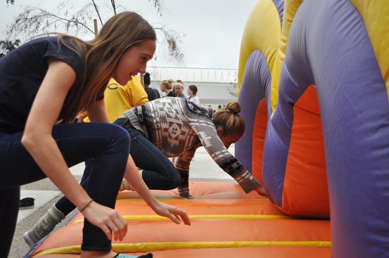 Sophomores Keira Dagy and Cassidy Mayer were many of the pairs to file through the Grand Canyon University obstacle course Wednesday at lunch. As a promotion, GCU brought a giant, inflatable, obstacle course and allowed students to race each other. The winner of each race received purple GCU sunglasses. 
