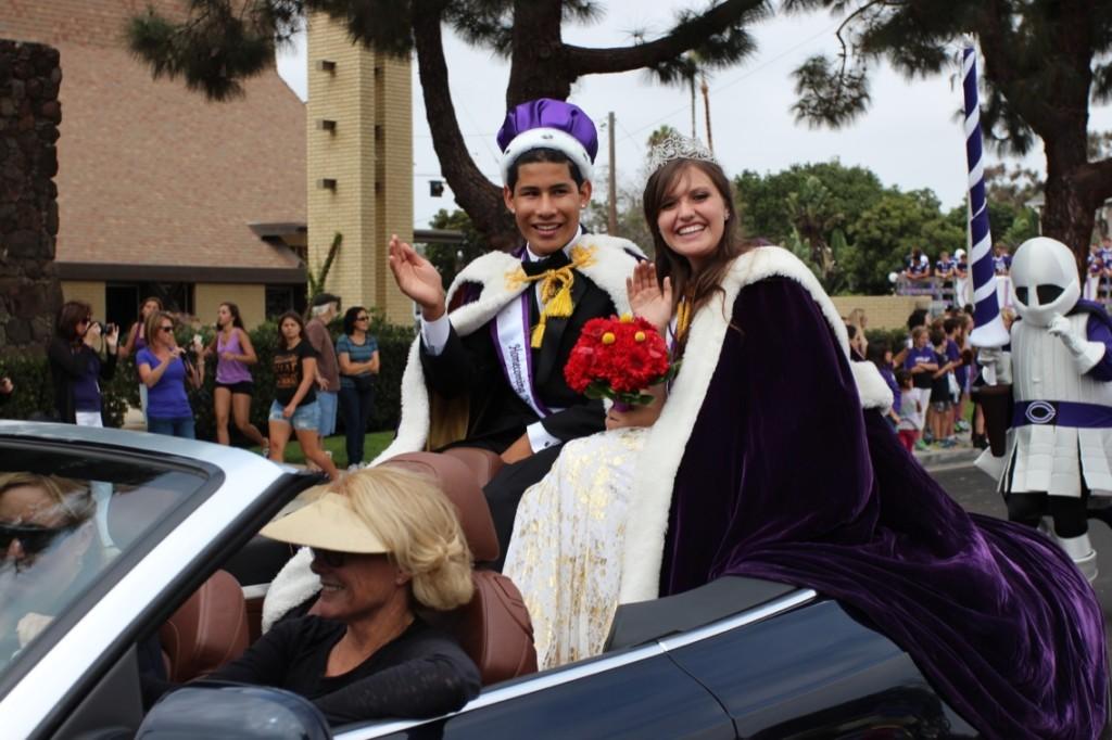 Dressed in their royal apparel, Queen Maddy Oas and King Marc Reina wave to the crowd. With a smile on their face, Maddy and Marc rode throughout downtown Carlsbad in celebration.