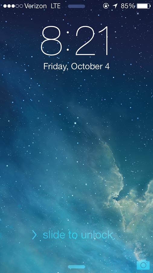 iOS 7 greets iPhone users with a brand new interface, starting with the lock screen. From here you can access your notifications, control center, and Siri.