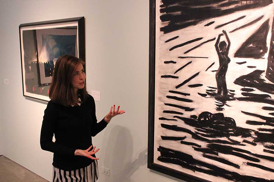 Senior Courtney Lakoduk discusses a painting at the Oceanside Museum of Art. Ladouk expresses her passion for art by interning at the museum. She plans to study art history at the University of Chicago next year. 