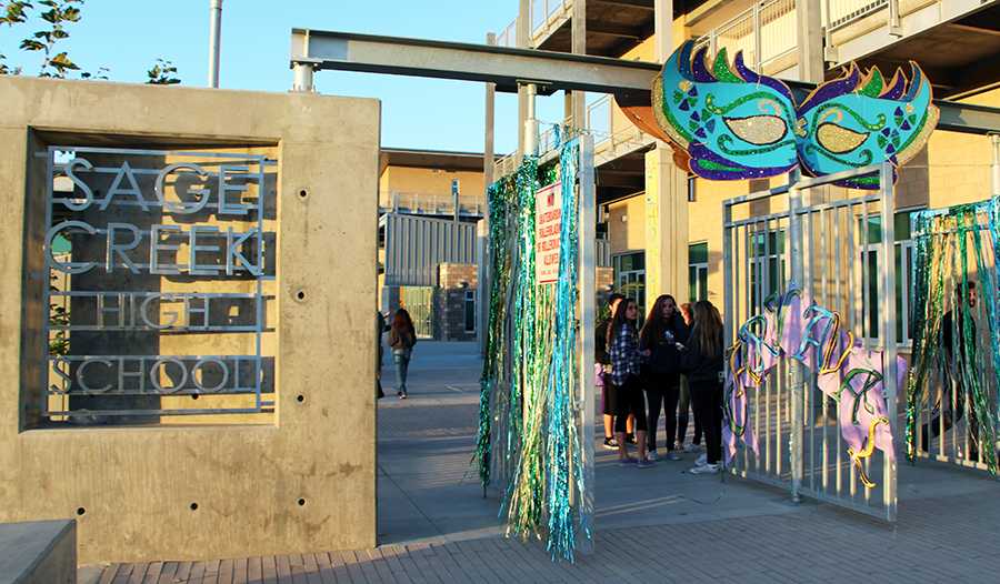 The entrance to Sage Creek High School was decorated with bright, festive, and Mardi Gras  themed decorations.  Since Sage Creek does not have a football team, they celebrate the equivalent of Homecoming with Hoopcoming, centered around the basketball season.