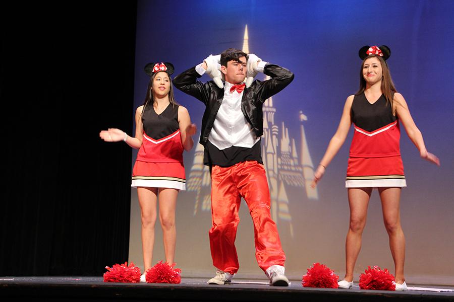 Junior Eli Cullinan preforms Hey Mickey with fellow classmates in the ASL show. The ASL show happens twice every year and is preformed by ASL three and four. 