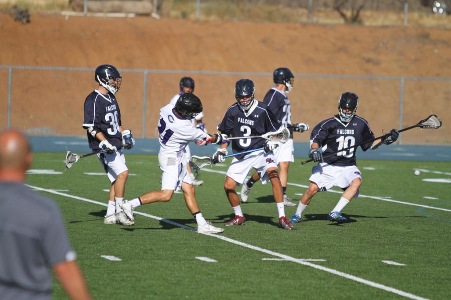 Freshman Jake Keller rips a sidearm shot around a triple team of Scripps Ranch defenders. Keller had two goals in the Championship at key points in the game.  