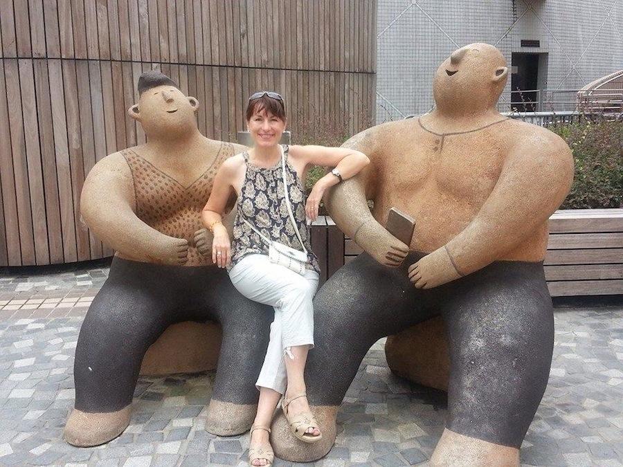 Señora Wakefield smiles happily as she experiences Asian culture  on her once and a life time trip. 