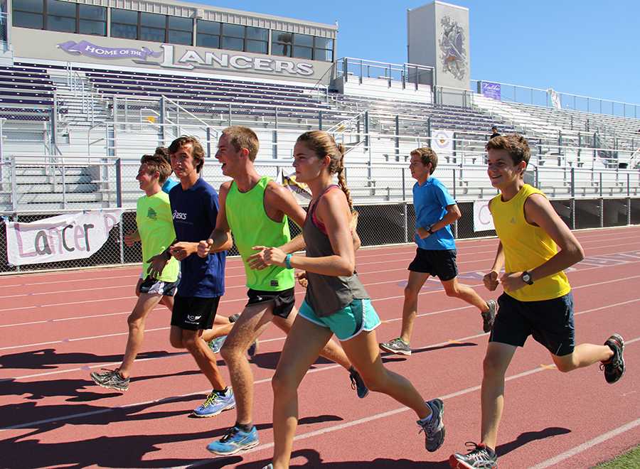 Members of the cross country team practice in the heat to train for a good season. Their first meet is Sep. 20, the same day as homecoming.