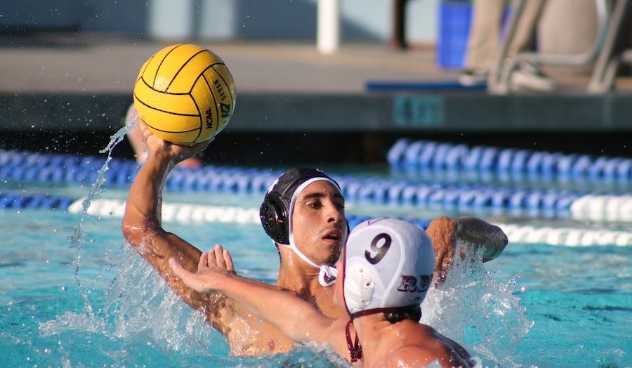 Senior Conner Chanove prepares to pass to a fellow team mate. Chanove has participated in the Carlsbad High School water polo program for four years. 