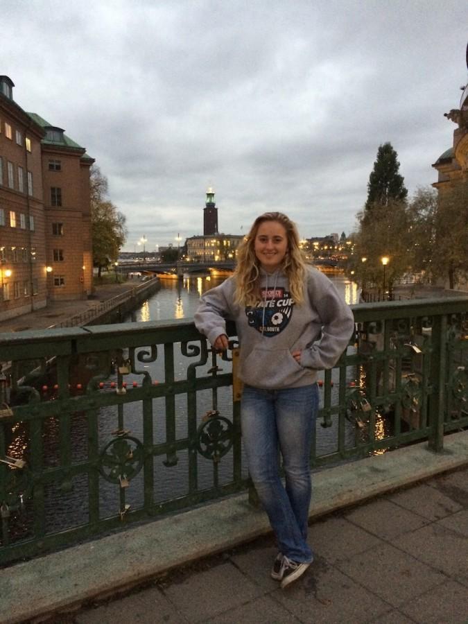 Emma Wenger hangs out with friends in old Stockholm , a touristy place to eat and shop. 