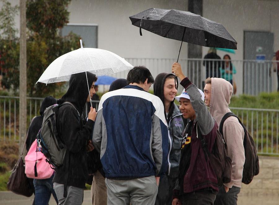 Carlsbad juniors gather for protection in the rain. Because we experience little rain in Carlsbad, when it does rain it is a big ordeal.