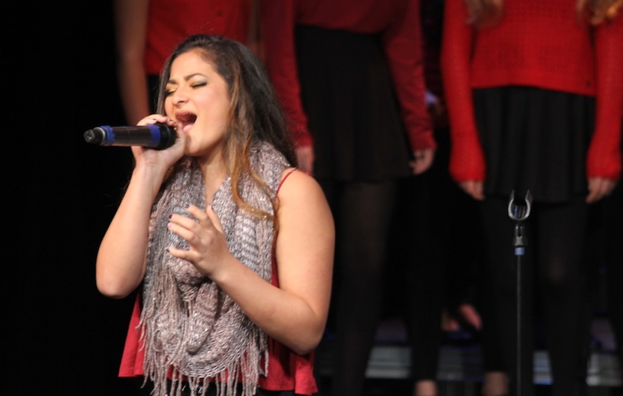 Junior Ellie Dodaro perform a solo for Carlsbad High Schools choir concert. The choir performs an annual holiday concert to get everyone in the community in the holiday spirit.