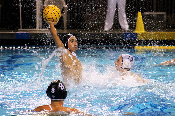 Senior Connor Chanove throws the ball to his teammates during the final game of CIFs.  The Lancers took on La Costa Canyons Mavericks and came out with a win to repeat last years CIF division one title.