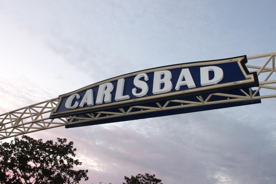 On Thurs. Jan. 8th, many people gathered around to witness history being made as the new Carlsbad sign was lighted at the corner of Carlsbad Village Drive and Pacific Coast Highway.  Over one thousand residents attended the event and Kids for Peace created a time capsule with hand written notes from many to be opened 25 years from now.