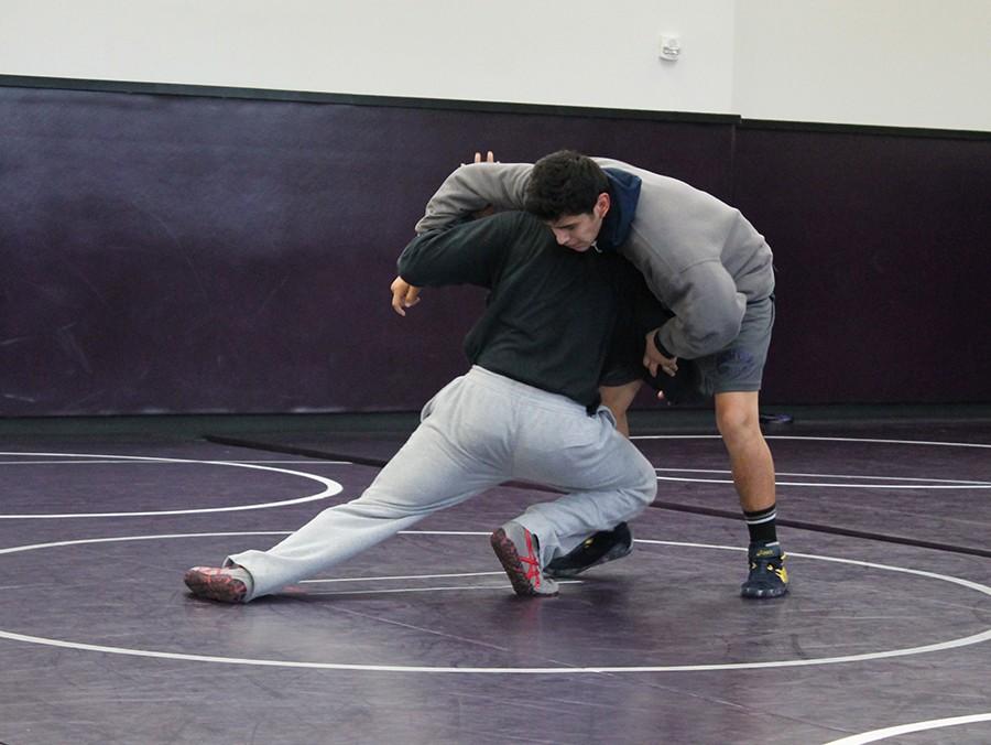 Senior, Josh Jeetan, wrestles his teammate to prepare for their CIF playoff matches. As always, Lancers are hoping to obtain a victory this year.