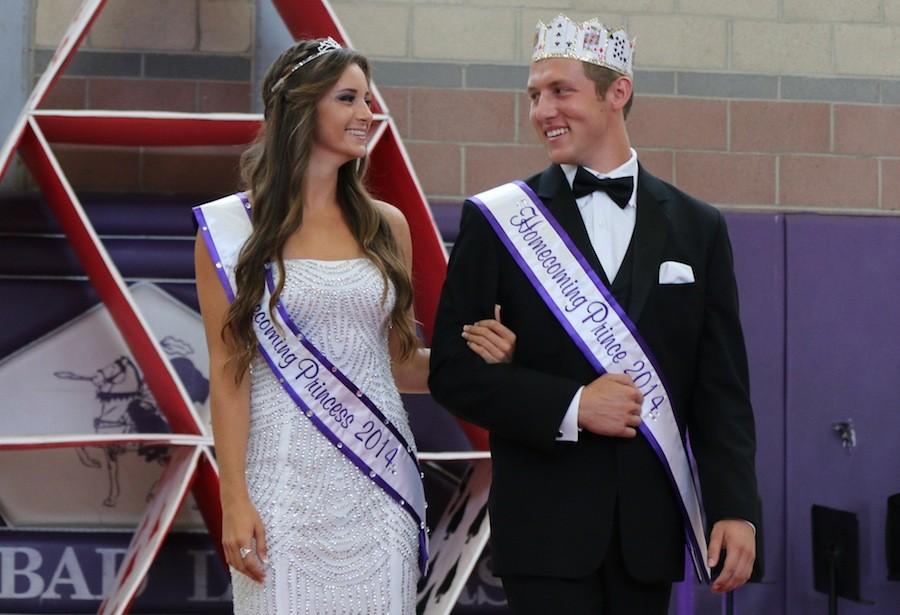 Senior+Michael+Ricci+walks+down+the+court+as+a+prince+during+the+2014+homecoming.+Ricci+is+not+only+involved+in+ASB%2C+but+also+football+and+chstv.