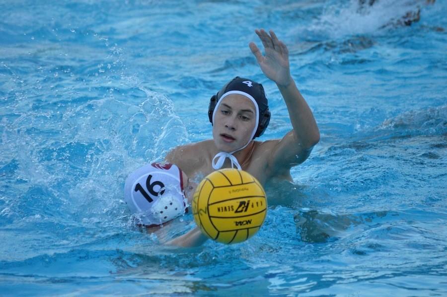 October 13 boys JV Water Polo matched up against J Serra. Sophomore, Connor Hanan blocks a pass contributing to a Lancer win.