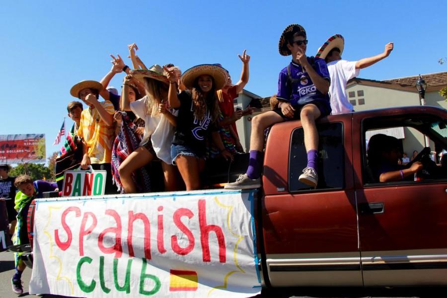 The Spanish Club rides on their float in the Lancer Day parade.  Spanish Club meets the first even Monday of each month in room 5004.