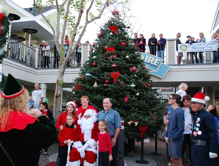 The Annual Holiday Tree Lighting for Carlsbad was on Sunday Dec. 6. Rotary club hosted the event and Mayor Hall lit the tree. Families had the opportunity to take pictures with santa in front of the tree.