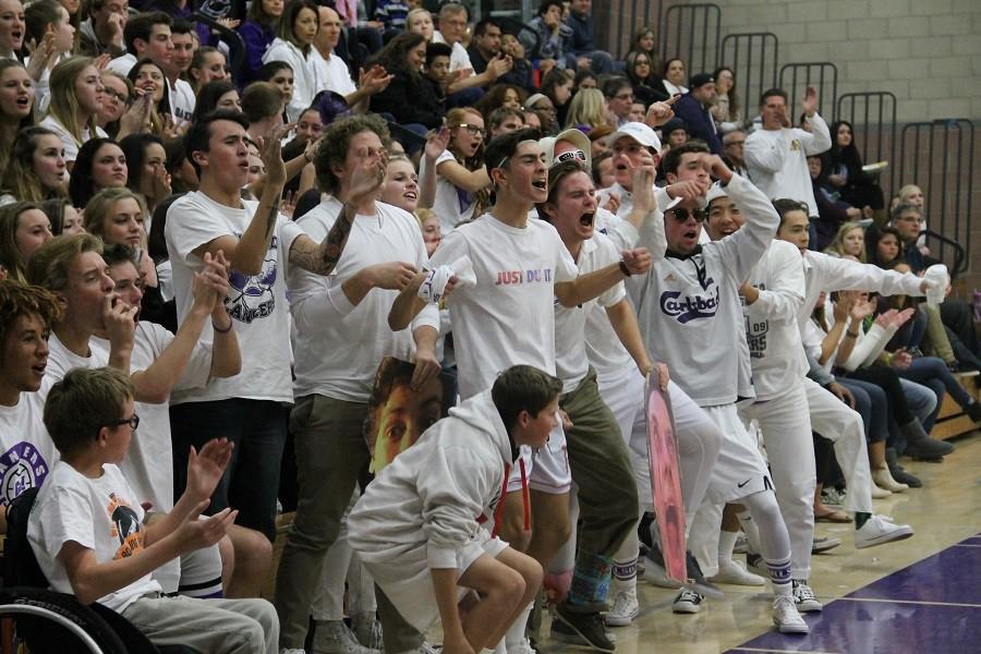 The crowd is in an uproar when Orange Glen steals the ball and looks as if they are going to score. Throughout the game, the crowd of Carlsbad students in white shirts is very supportive of the team. 
