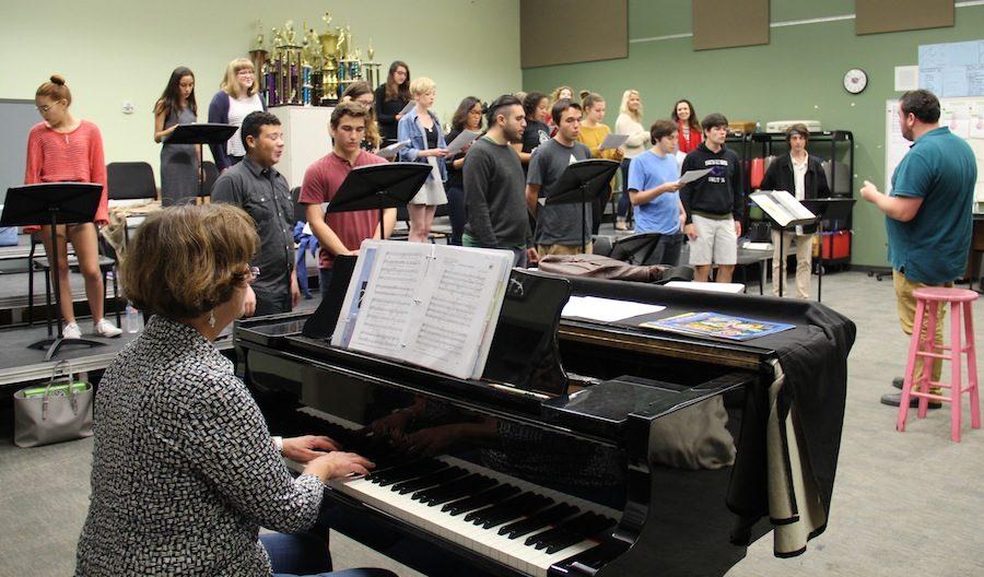 Mr.B+running+through+a+set+with+his+students.+There+are+multiple+different+choir+classes+including+Encore%2C+Chamber+Singers%2C+and+Sound+Express.