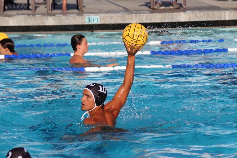 Junior+Gavyn+Wilson+looks+in+the+front+court+for+opportunity+from+his+teammates%2C+Tuesday%2C+Oct.+10.+The+varsity+water+polo+team+plays+Bishops+High+School+on+Oct.+10%2C+and+lost+6-11.