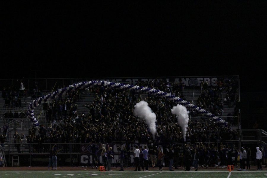 Carlsbad shows off their new CO2 cannons for the loud crowd. The student section was completely filled for this CIF playoff game against cathedral.