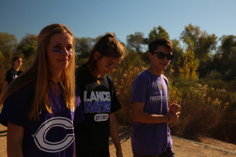 Senior Max Ward and juniors Nicole Less and Nevina Rocco begin their walk, Saturday, Dec. 2. Members of the best buddies club participated in the second annual San Diego Best Buddies Friendship Walk at Kit Carson Park.