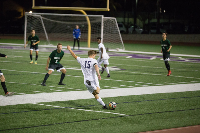 Senior Tyler Francis prepares to take a shot in the game last Friday Feb. 16 against the Sage Creek Bobcats. The Lancers won 1-0 on their Senior night.
