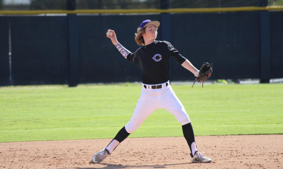 Freshman Konrad Bohnert throws the ball to first base in hopes for an out. The JV team played Rancho Bernardo and lost six to four.