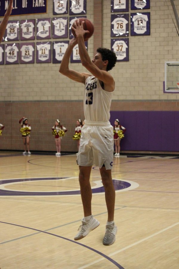 Senior Carter Plousha goes up for the shot. The Lancers are 24-6 on the season and play Bonita Vista on Feb. 20 at 7 p.m. in the Lancer Arena.