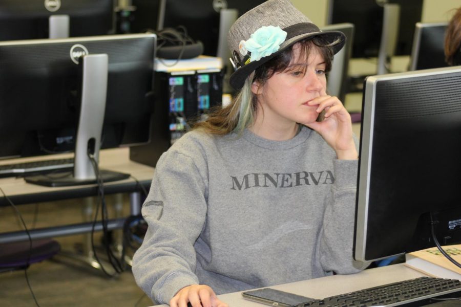 Corin Magee, 12, works on her coding program in Saied Moezzis computer science class.