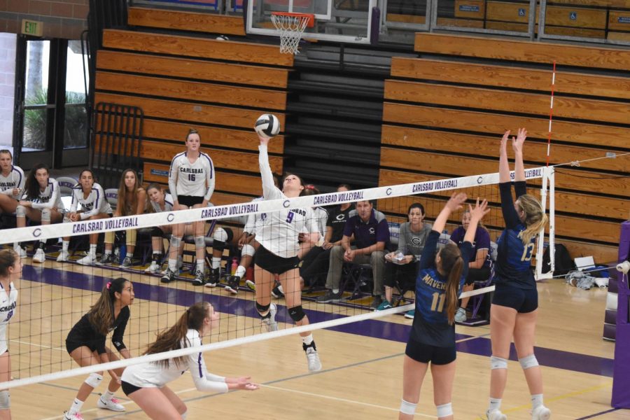 Sophomore+Megan+Corona+hit+the+ball+in+order+to+score+a+point+for+the+team+in+the+second+set.+Carlsbad+ended+up+winning+against+La+Costa+Canyon+in+the+third+set+with+incredible+upset+victory.