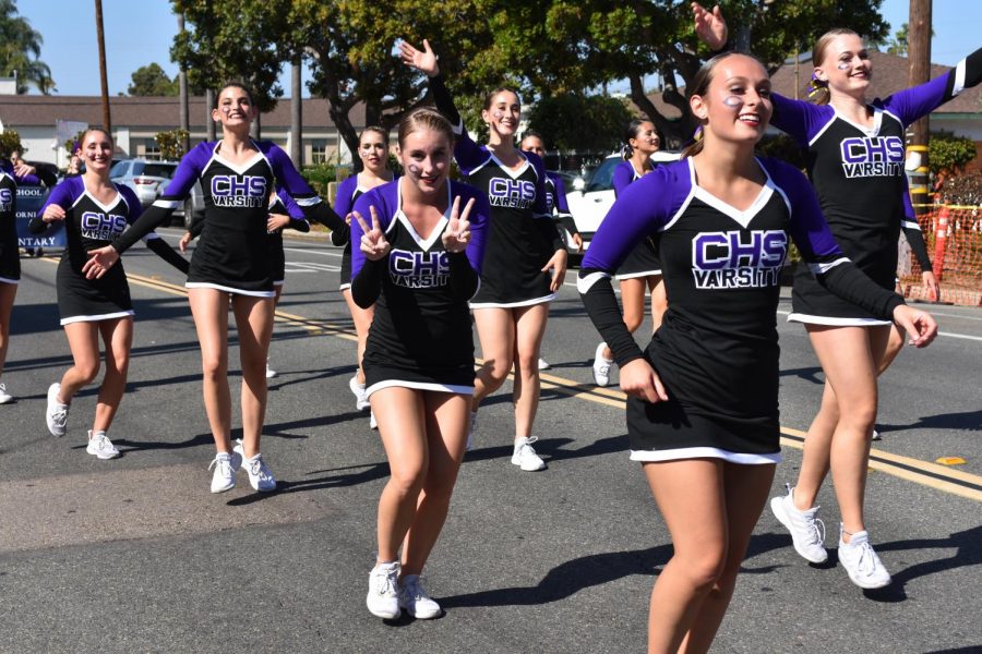 Lancer Dancers dance through the streets of down town Carlsbad, with Senior Maddie Dufault leading the charge. The Lancer Dancers perform tirelessly through the whole parade.