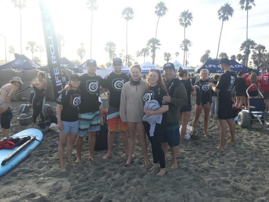 The+Reyes+family+gathers+with+big+smiles+to+capture+the+moment+at+the+Life+Rolls+on+event.+The+surf+event+took+place+on+September+22%2C+2019.
