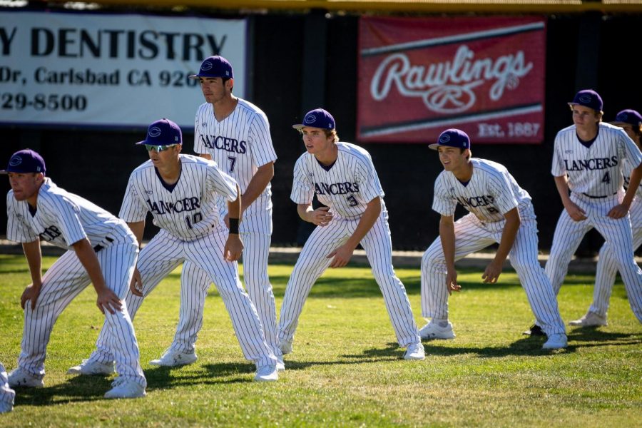 Varsity baseball does sprints before a game. Photo courtesy of coach Jake Savicki.