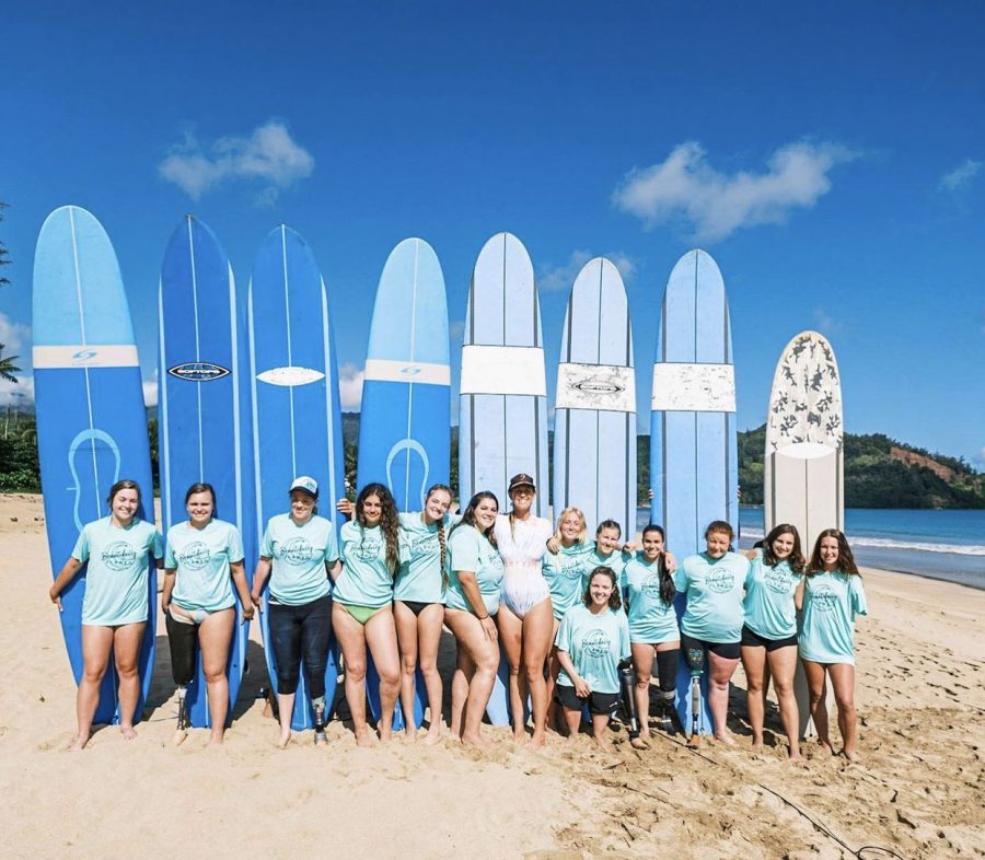 Girls from all walks of life join together on the beach at The Beautifully Flawed retreat. The girls participated in many different actives at the retreat including surfing.   