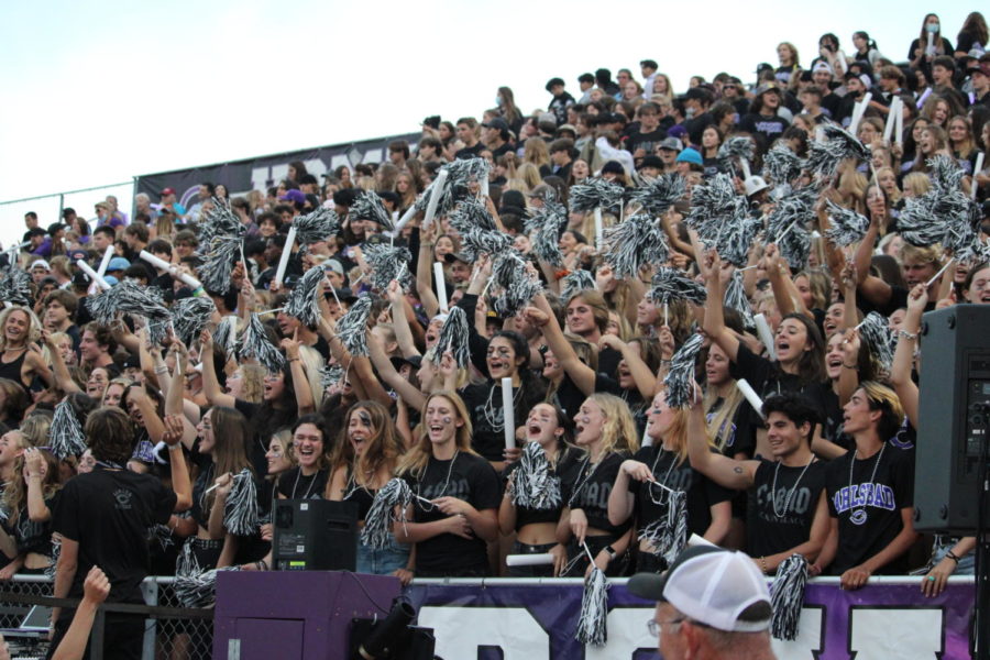CHS Loud crowd cheers at the first fully attended football game of the year. 