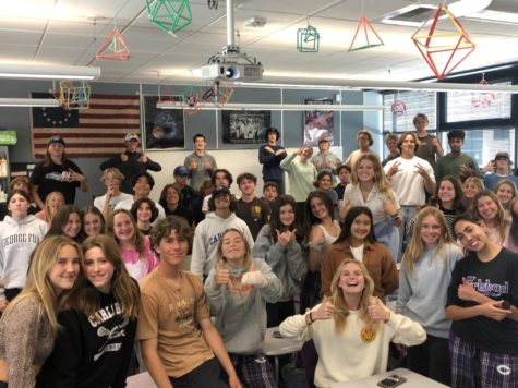 Younglife Lunch Club Crew gathers together to smile for a photo at the end of Club after enjoying time with their friends.