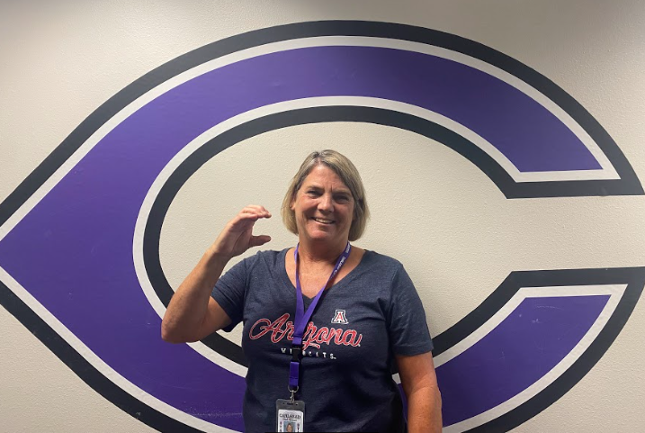 Cs up Lancers. Carlsbads new principal, Julie Redfield, shows lots of excitement for the upcoming school year.