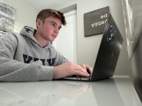 Junior Nathan Wilson works on his online history class at home through Silicon Valley.