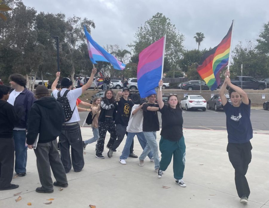 Flag-bearing CHS students show their support for the LGBTQ+ community at the demonstration by the main office.