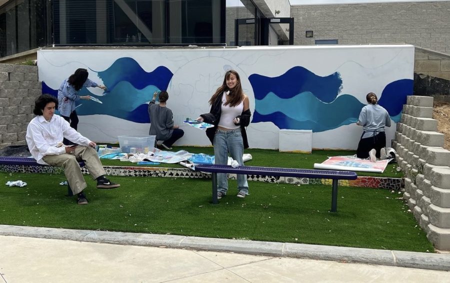 AP Art students paint the new mural in front of the ASB room following the AP test.