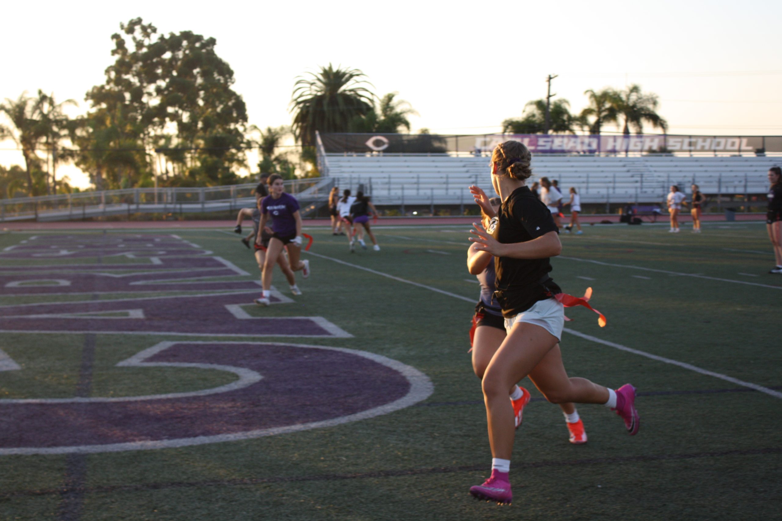 Senior Emerson Jarrad runs drills with her fellow teammates at their weekly practices.