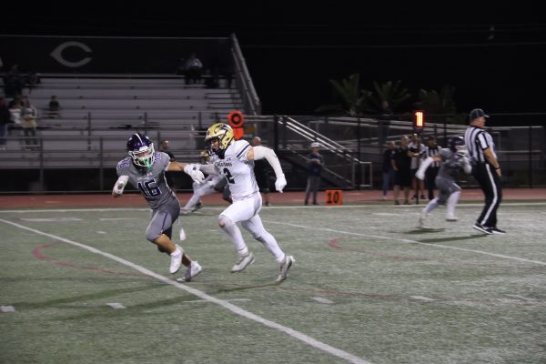 Skye Shaffer rushes down the field during the Camo game against Del Norte High School. The Lancers won 35-9.