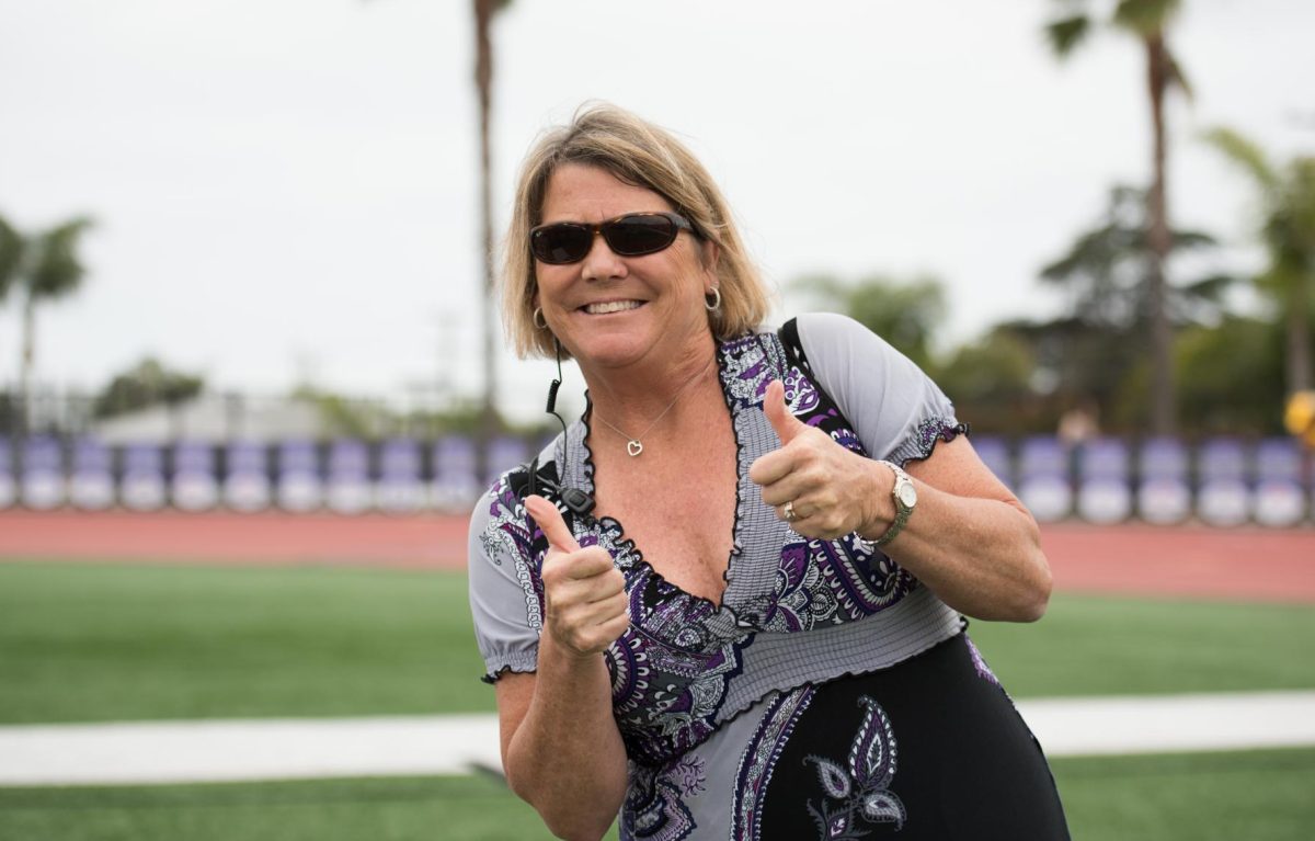 Julie Redfield representing Carlsbad pride on the football field.