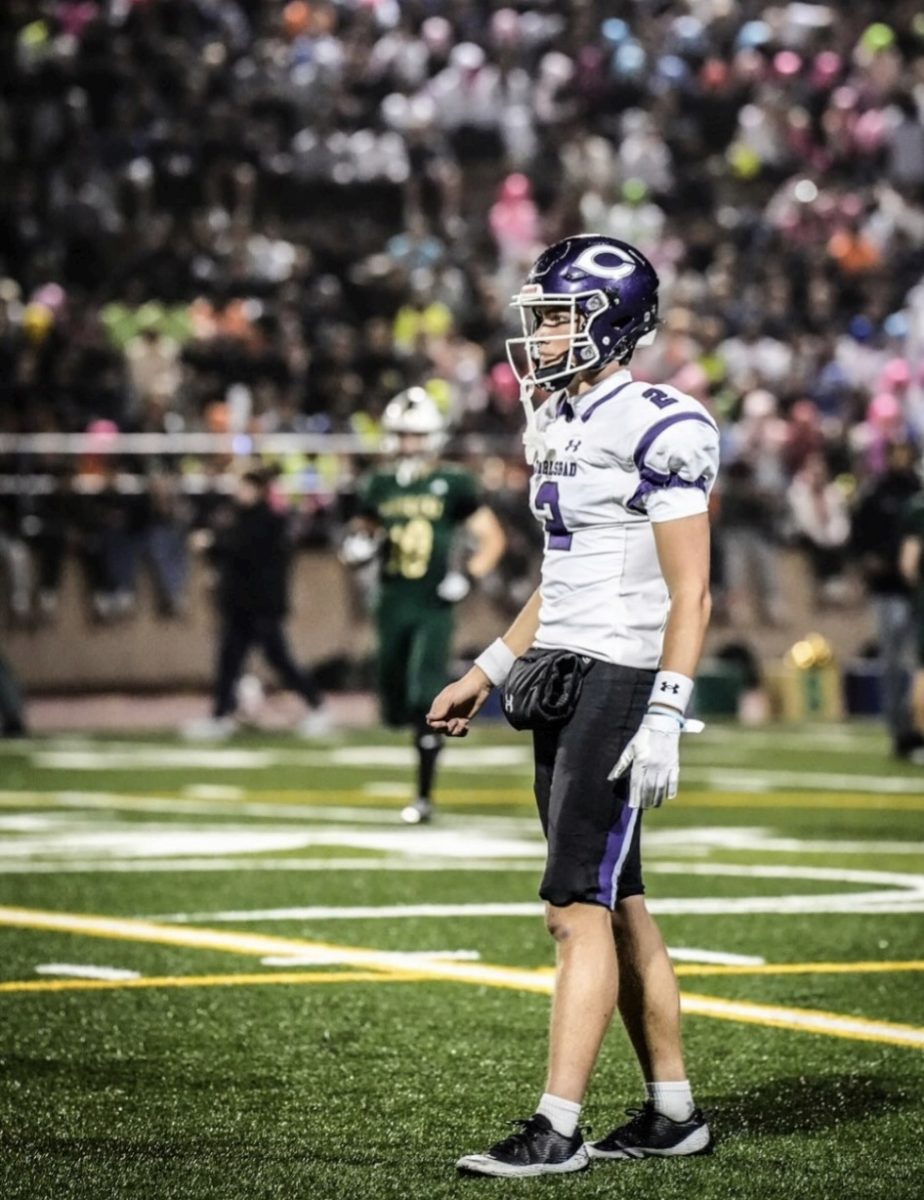 Carlsbad Football Player Eli Macneal playing for Carlsbad in November 2025.