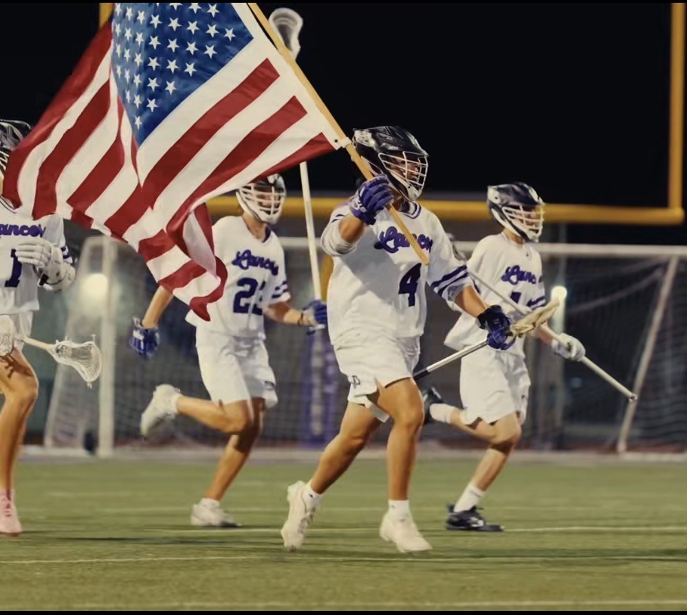 Senior Captain Jayden Lynds leading the charge before La Jolla lacrosse game. 