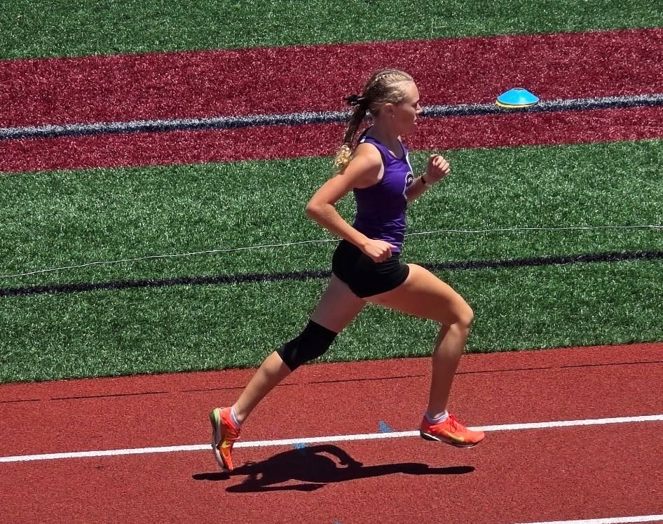 Varsity track and field athlete Pressley Stough running the 800m at NCC Coastal League Meet.